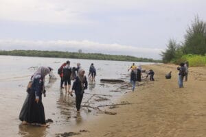 collecting garbage on the beach